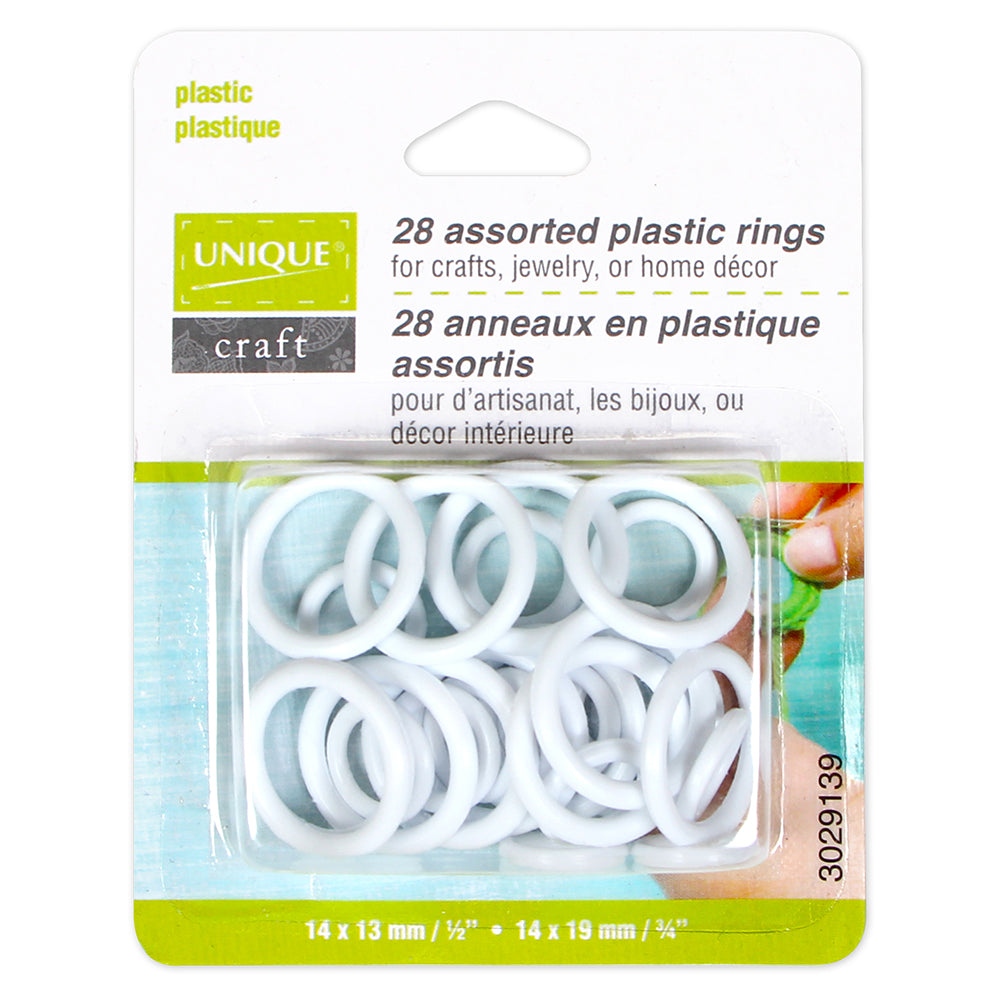 Unique | 28 Anneaux de plastique assortis